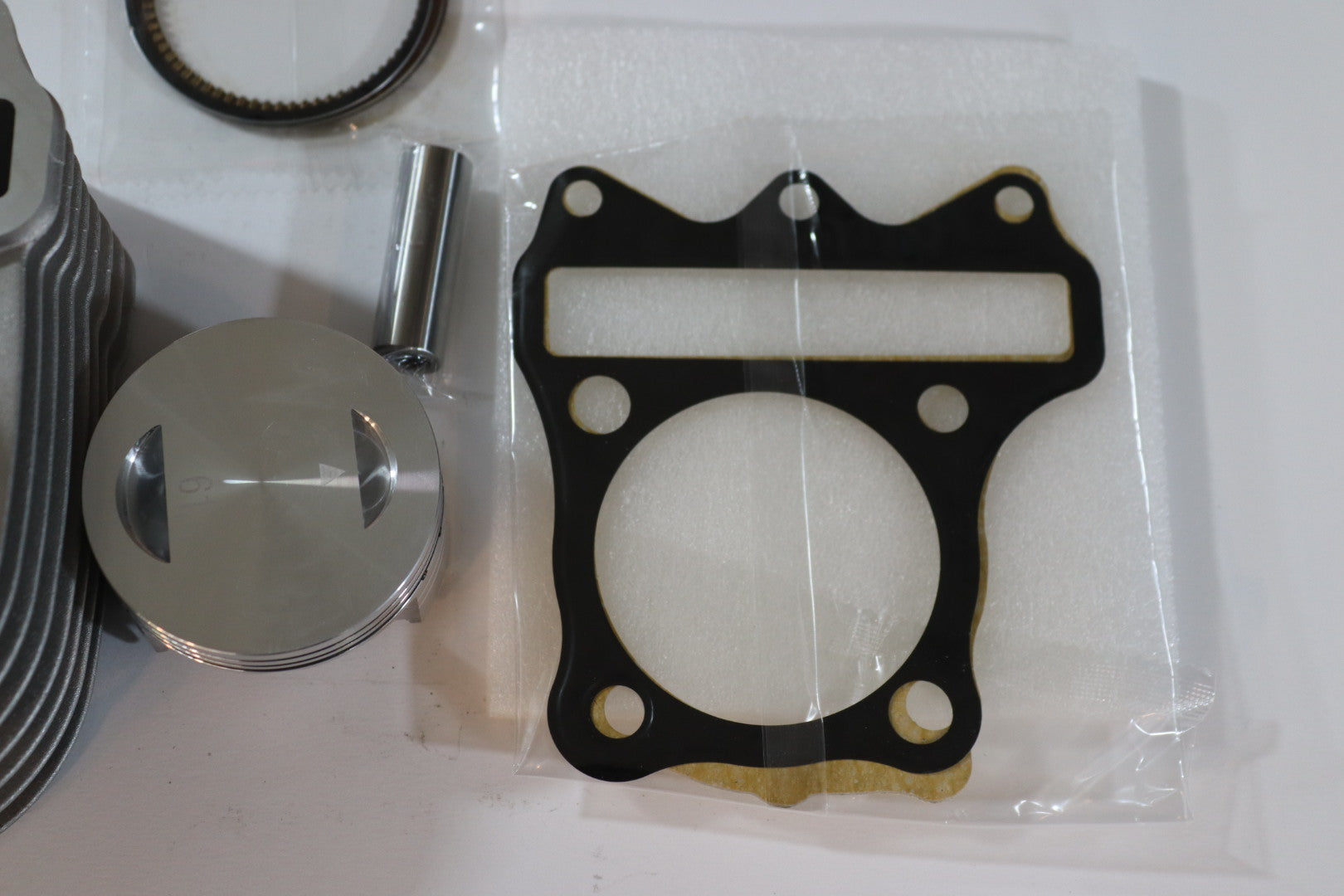 CYLINDER MOTEUR V125 CHARMO 61MM-سيلندر موتير V125 شارمو ٦١م