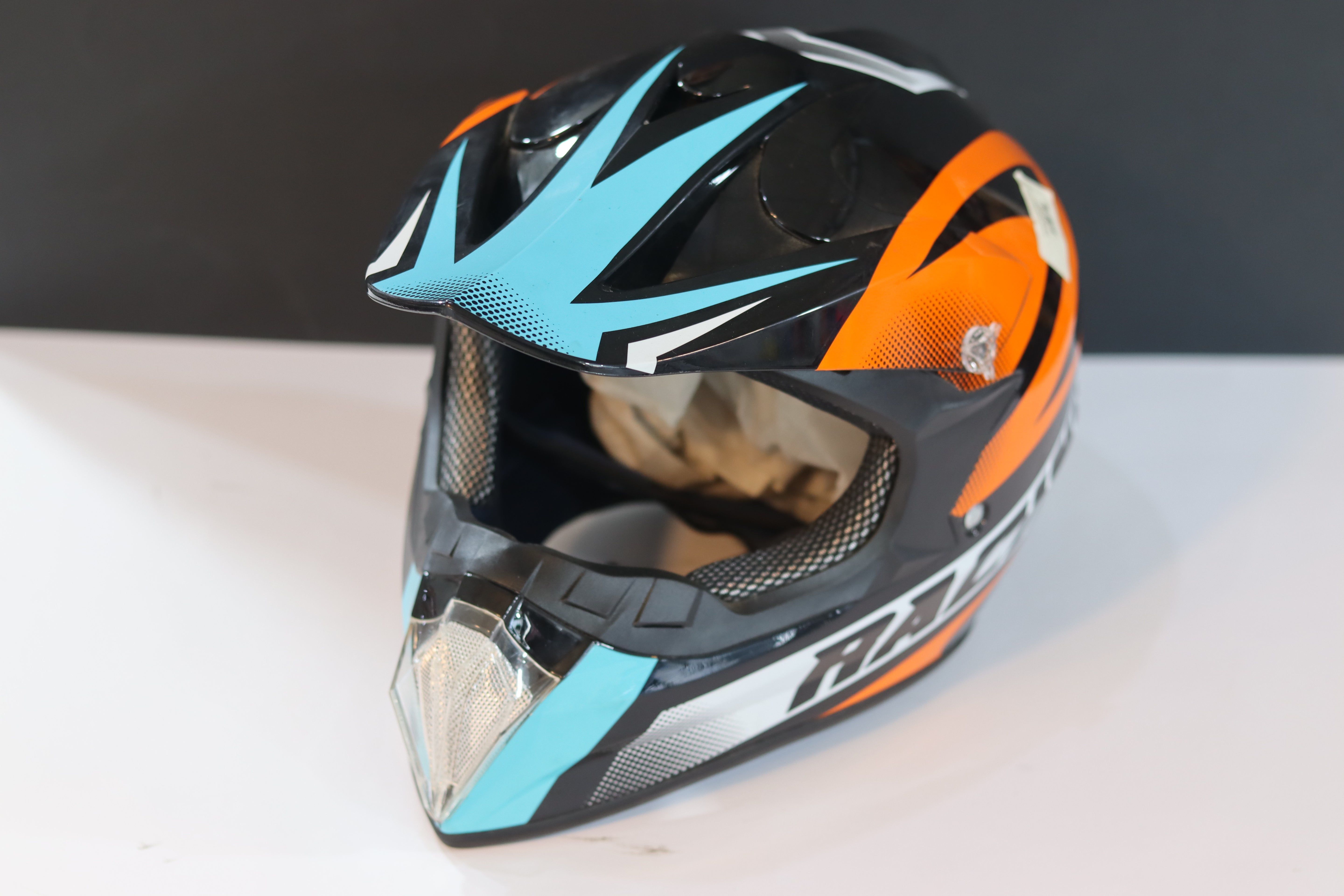 CASK CROSS ORANGE BLACK BLUE- كاسك كروس برتقالي أسود أزرق