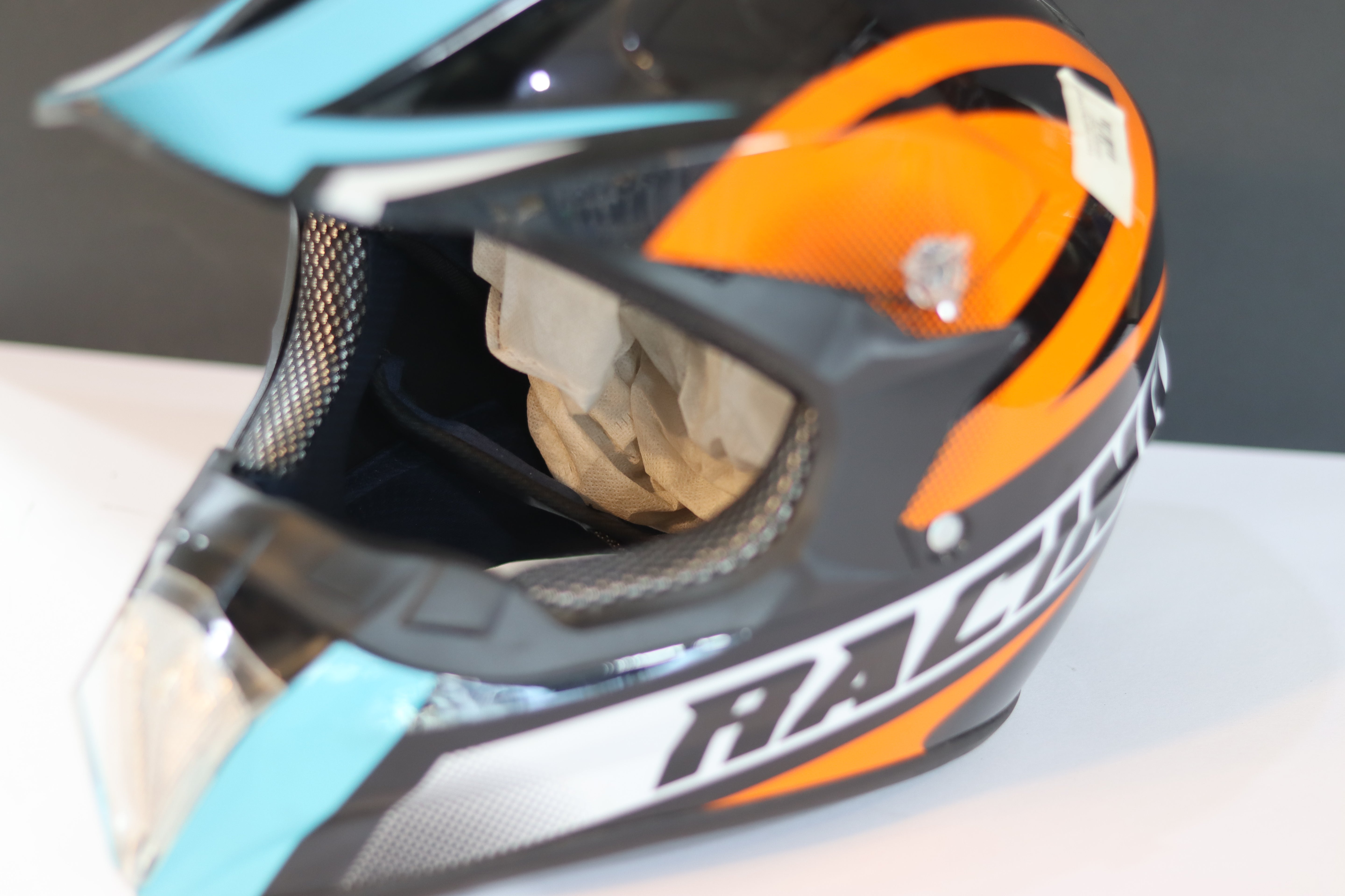 CASK CROSS ORANGE BLACK BLUE- كاسك كروس برتقالي أسود أزرق